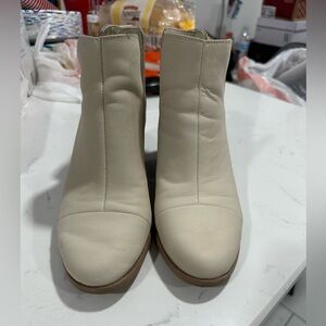 Tom’s ivory white booties